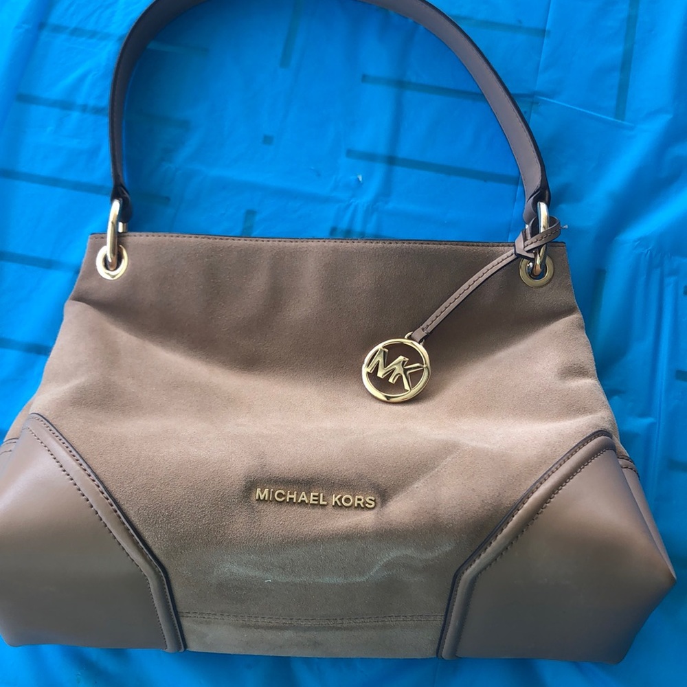 Michael Kors purse light brown/tan suede and leather material. Good condition